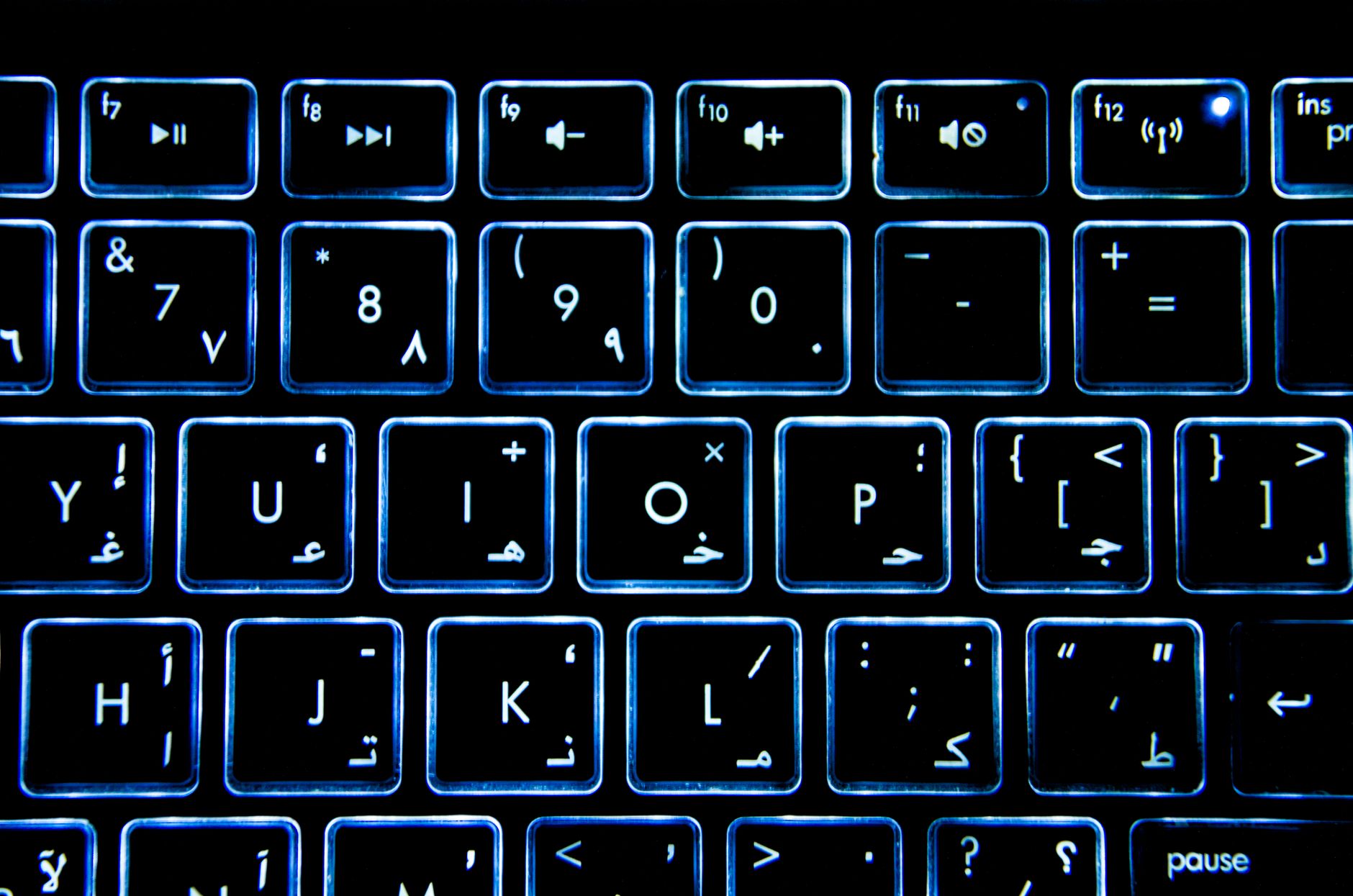 Backlit molded silicone keypad with illuminated numeric buttons
