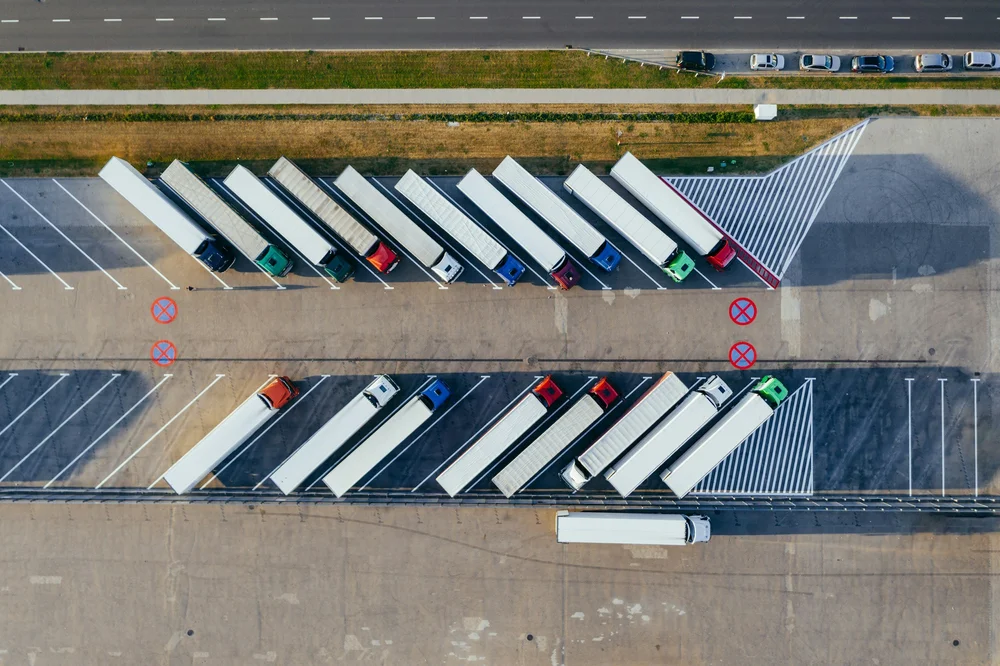 Freight trucks staged at a distribution yard