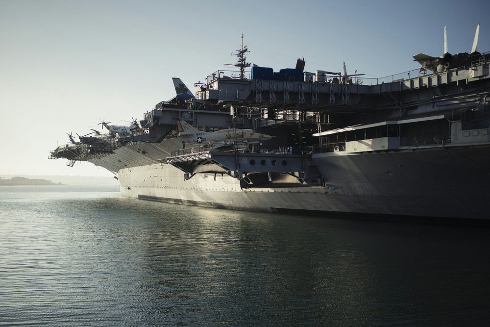 Aircraft carrier at sea with jets on the deck